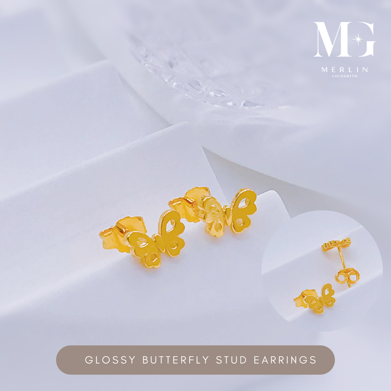Gold stud earrings in a glossy butterfly design from Merlin Goldsmith