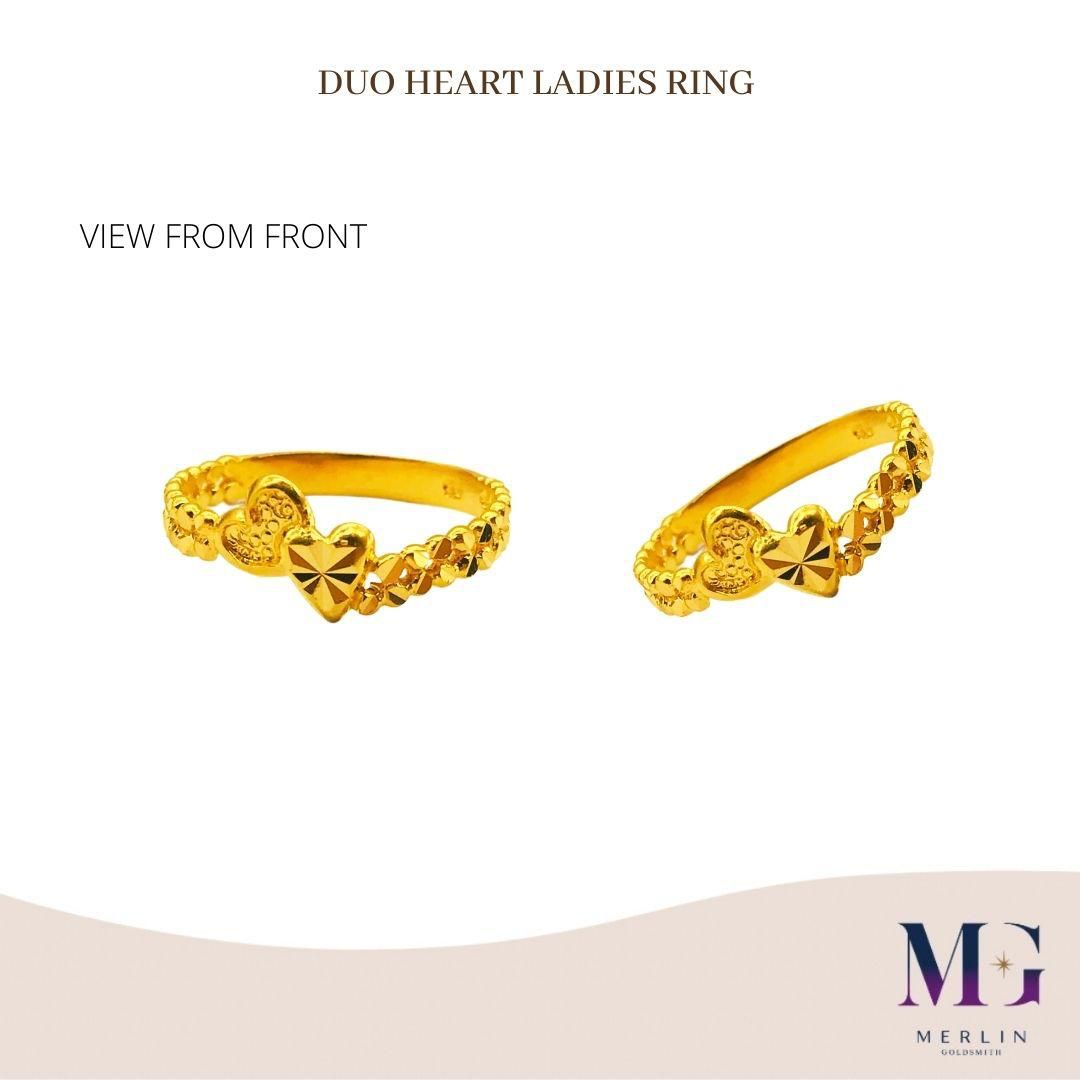 Gold ring with two on sale hearts